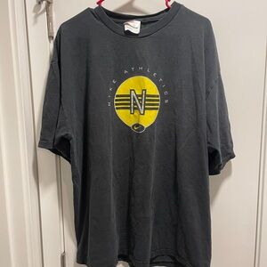 Nike Black Short Sleeve Tee with Yellow Athletics Emblem